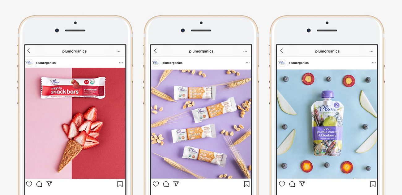 Three smartphone screens display Instagram posts from plumorganics featuring a red-themed snack bar, a purple-themed assortment of snack bars, and a blue-themed baby food pouch with fruits. This social media campaign showcases parenting unfiltered, highlighting the genuine connection between real parenting moments and Plum Organics products.